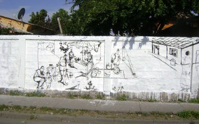 Registro de pintura mural realizada en muro oriente de la Villa O'Higgins, El Bosque